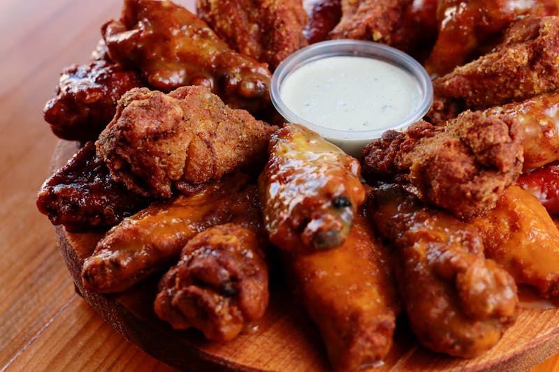 Mango Habanero boneless wings with tropical sweet-hot glaze