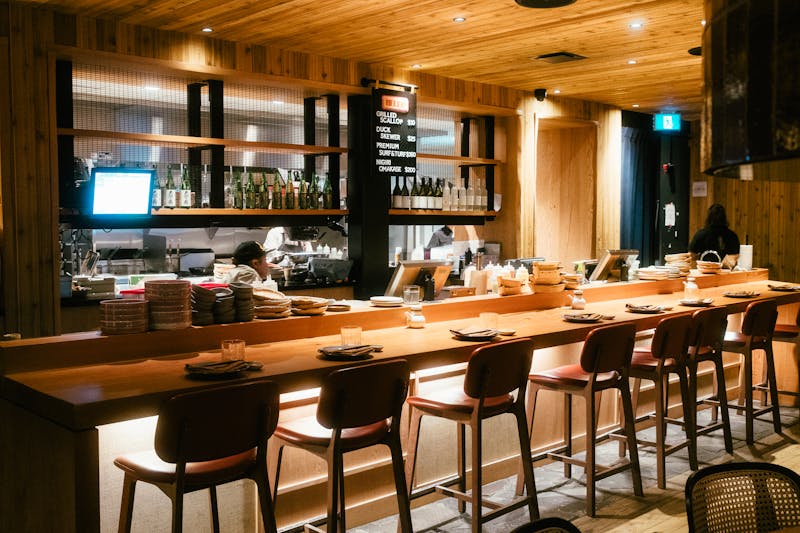 Wings over restaurant interior dining area